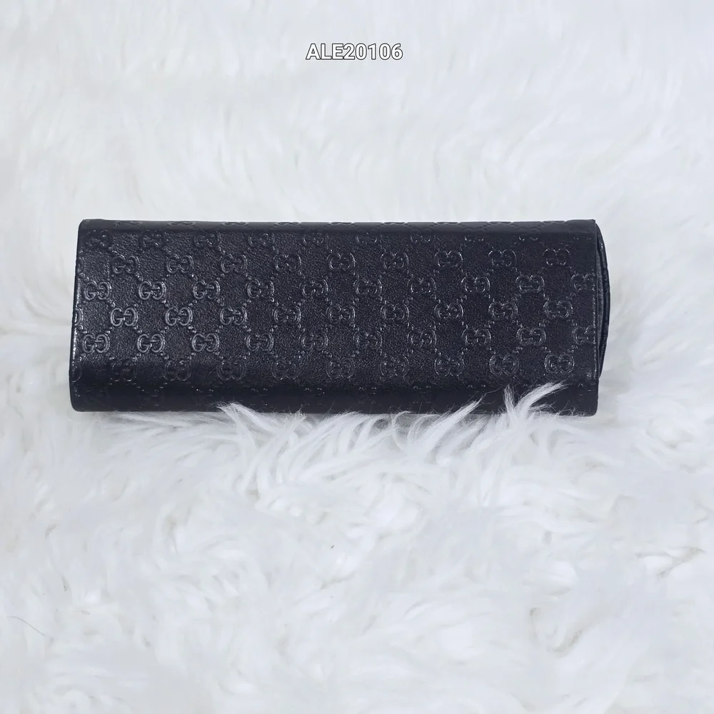 Gucci Brown Vintage pyramid Sunglass case Gucci monograms leather engraved.
